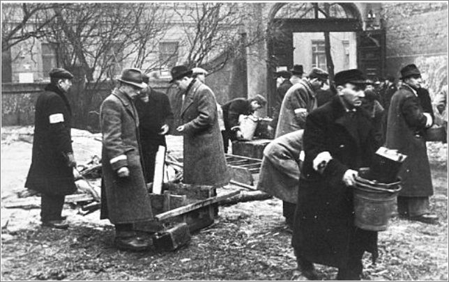 Jewish men assigned the task of clearing out the homes of the deported